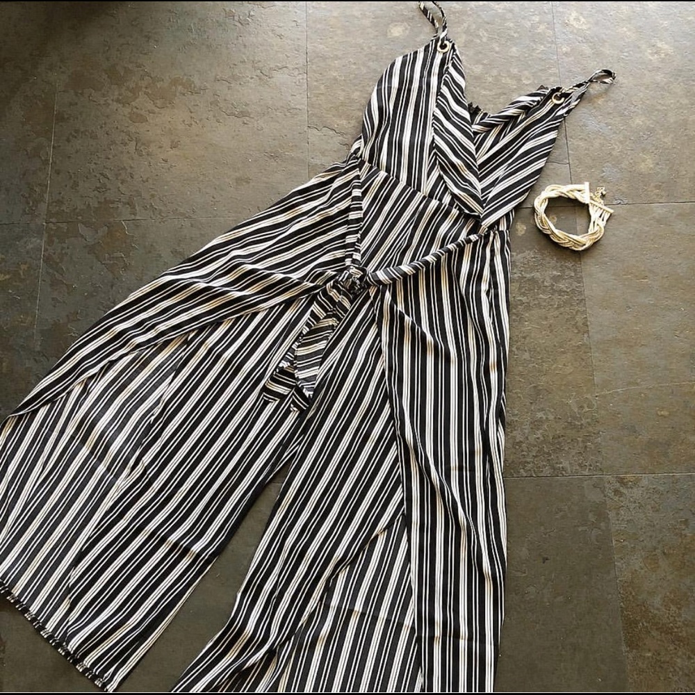 Striped one piece with tie front open front leg.